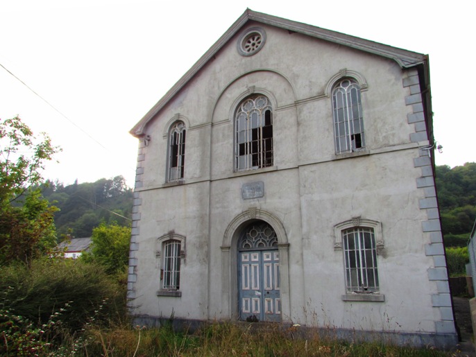 East front facing the road