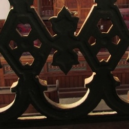 Cast iron panel set in the gallery rail