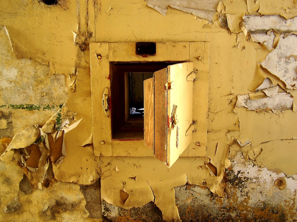 This hatch suggests that the room adjacent was a cold store