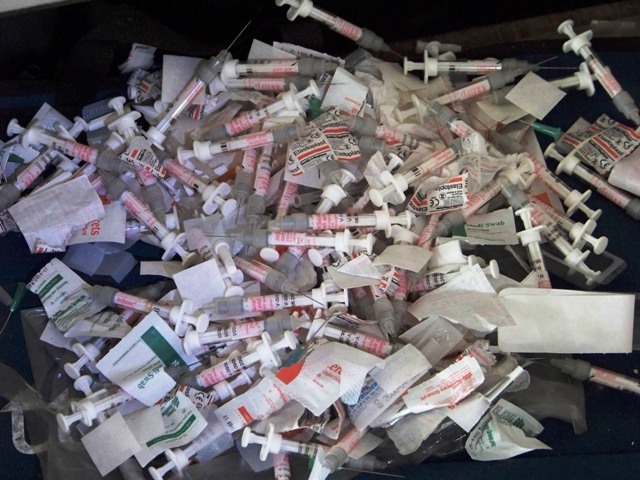Many, many syringes